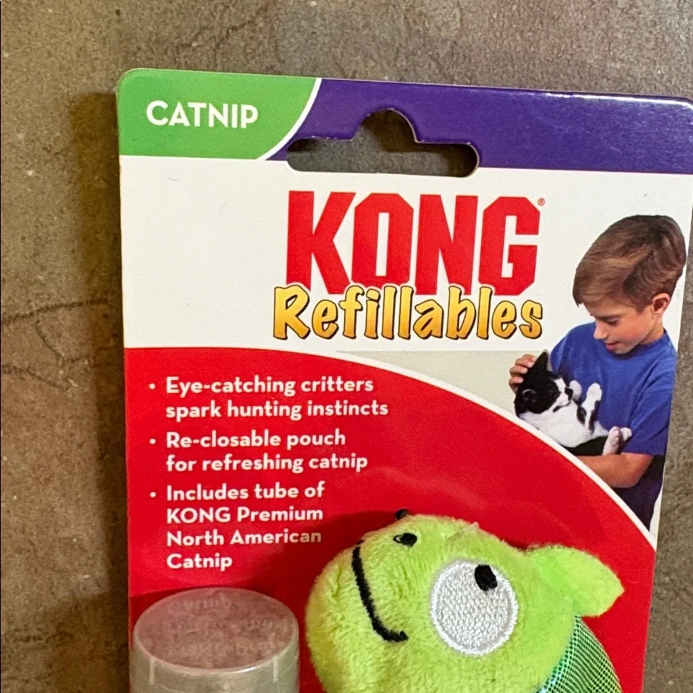 One catnip KONG refillables; Along with various cat toys. See pictures.